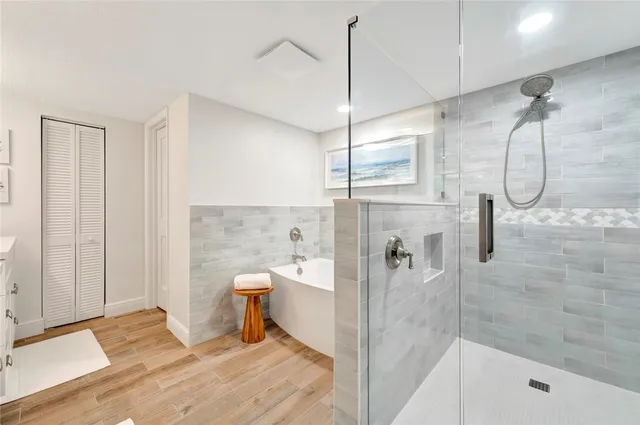 a bathroom with a sink double vanity and a mirror