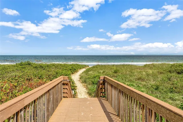 a view of a lake with a yard