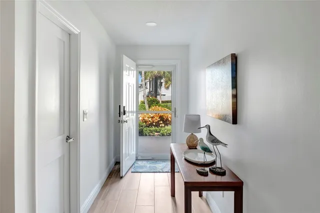 a bathroom with a granite countertop toilet a sink and a mirror