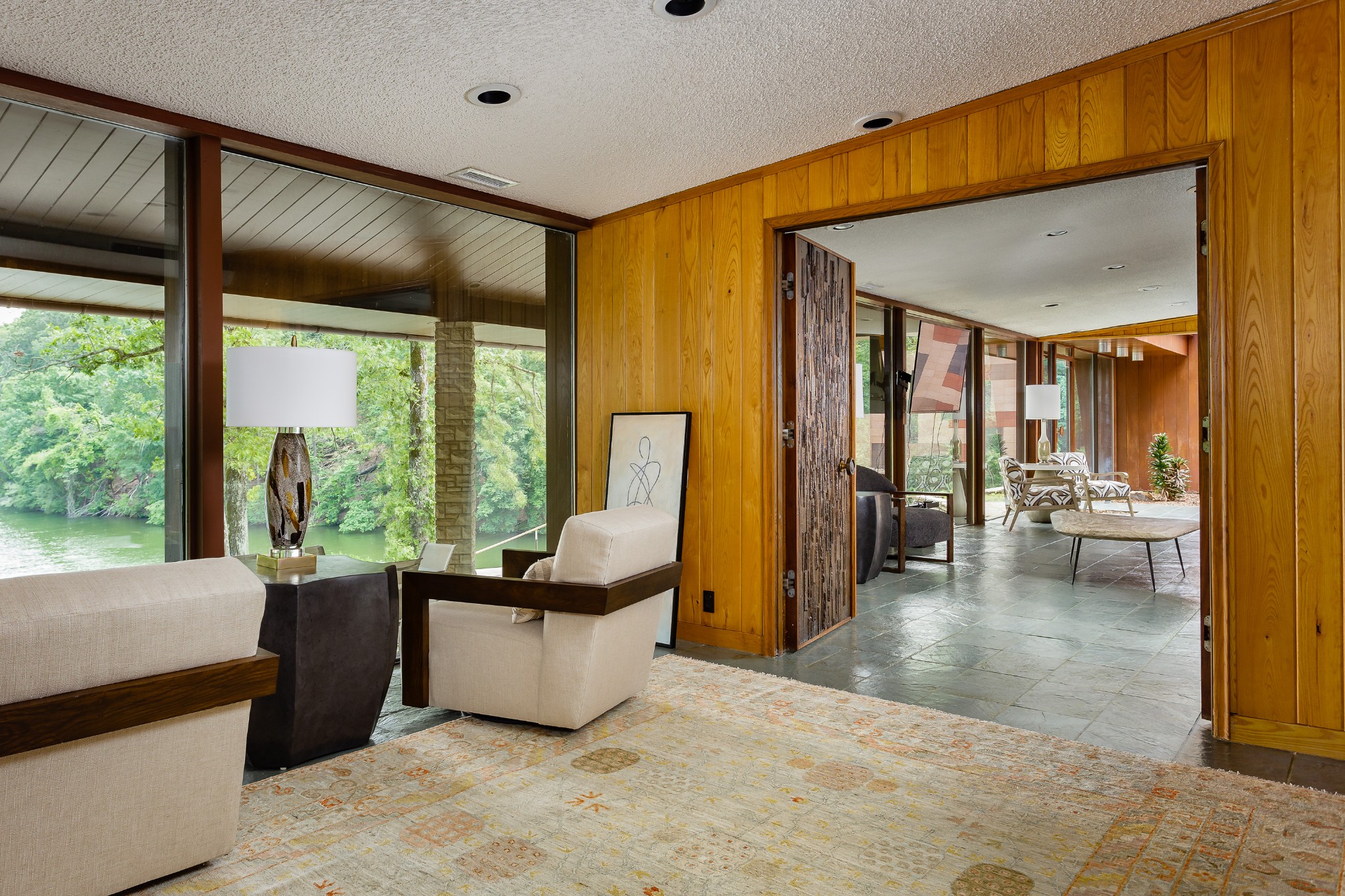 300 Elton Darby Road Florence, AL 35630 - Photo 16 of 66 a lobby with furniture and floor to ceiling window