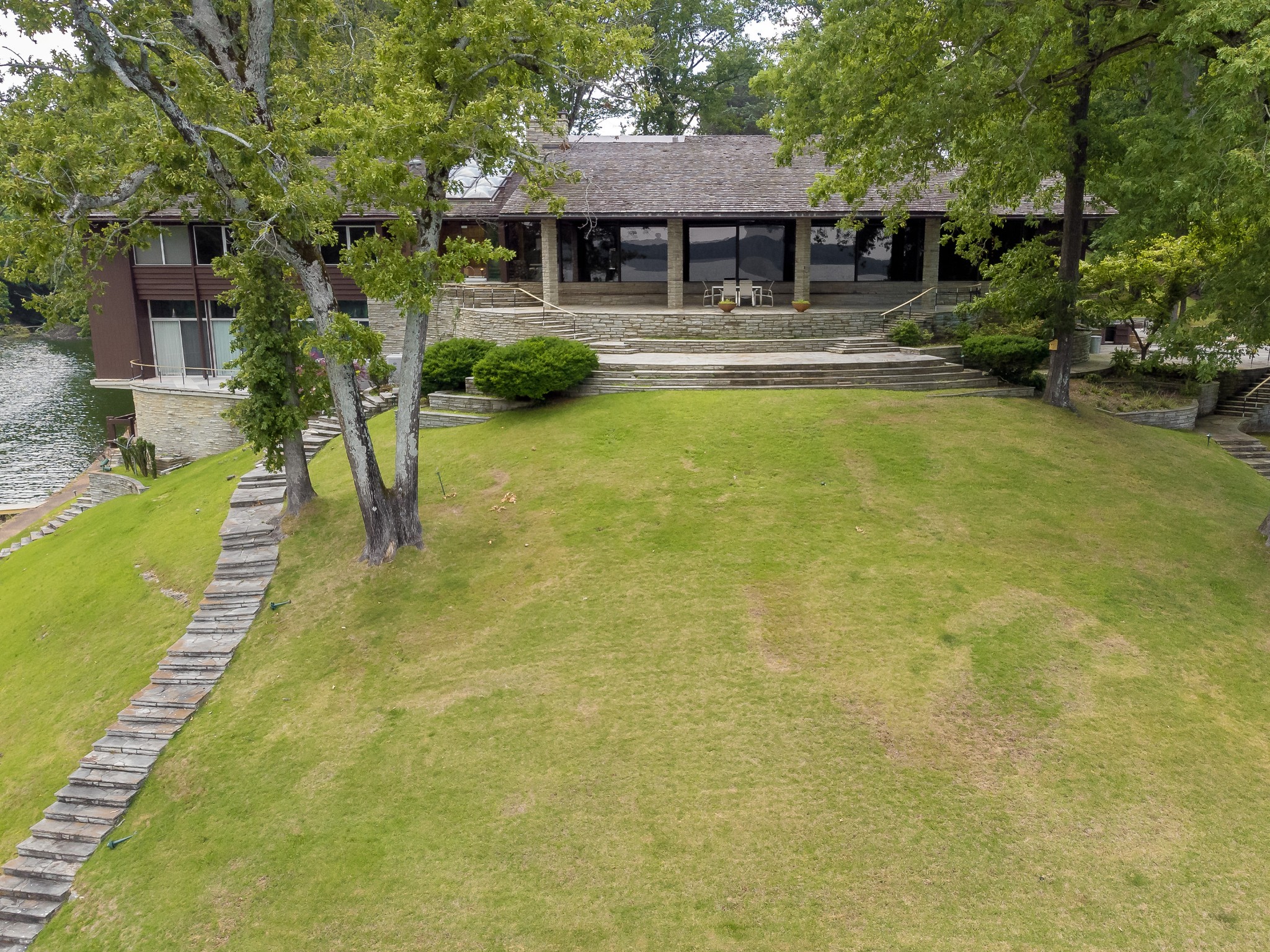 300 Elton Darby Road Florence, AL 35630 - Photo 49 of 66 a view of pool with lawn chairs and plants