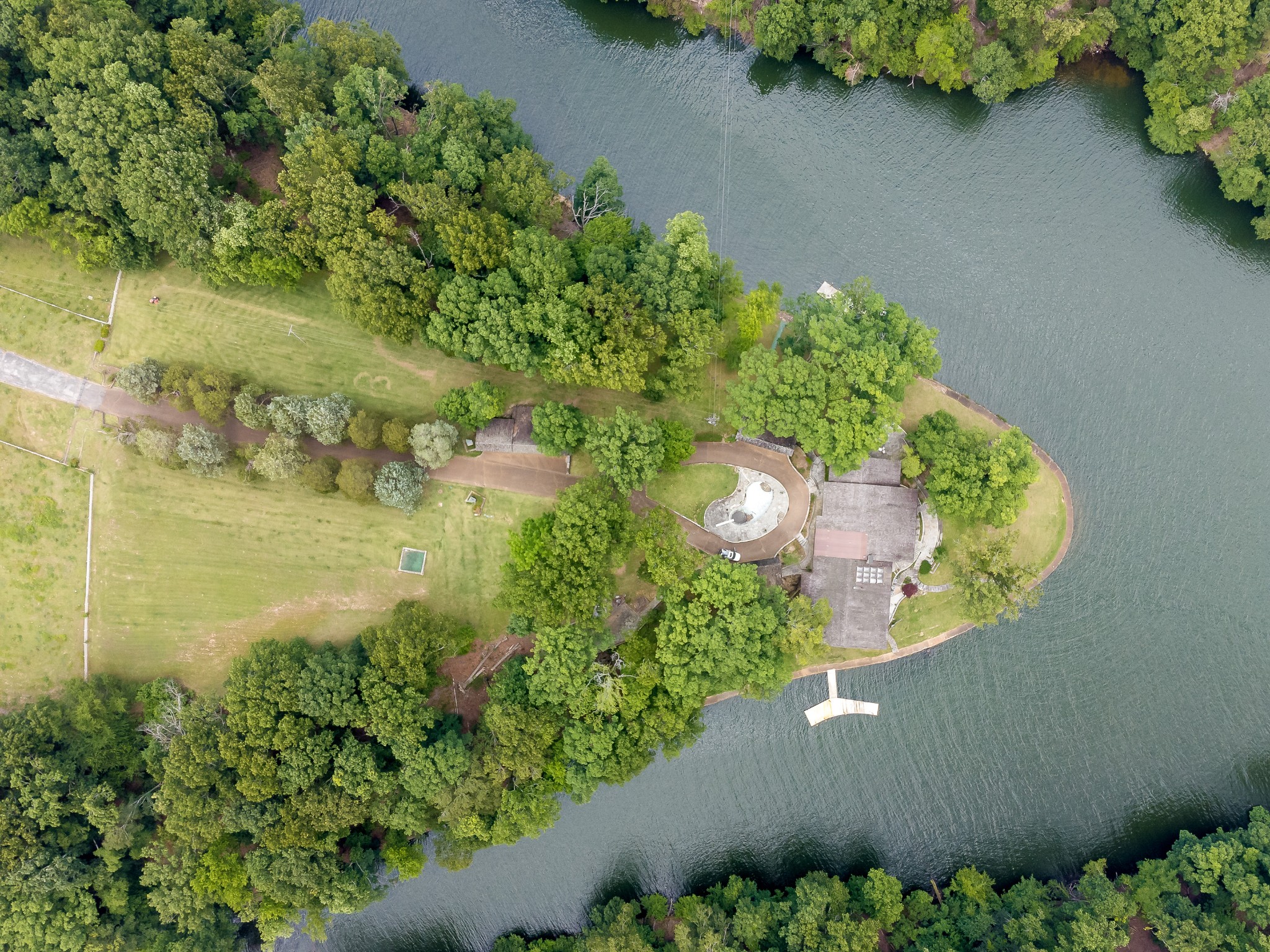 300 Elton Darby Road Florence, AL 35630 - Photo 62 of 66 a view of a lake with a yard