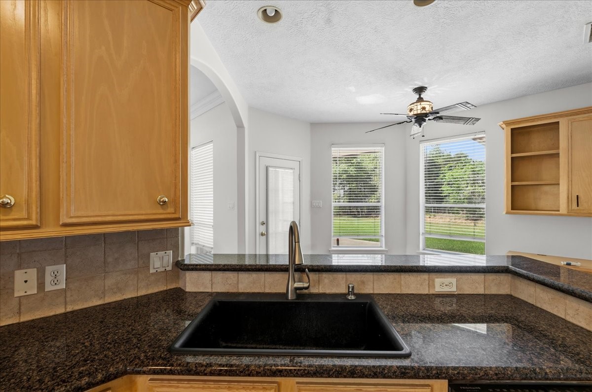 1607 Delta Lane Baytown, TX 77523 - Photo 17 of 48 The sink overlooks the living room.
