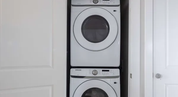 a close up view of a washer and dryer