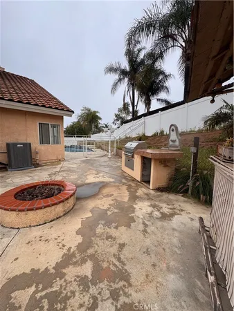 a view of a house with a yard and garage