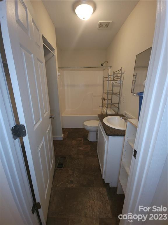362 Ewaldz Road Blacksburg, SC 29702 - Photo 5 of 13 a white toilet sitting next to a sink