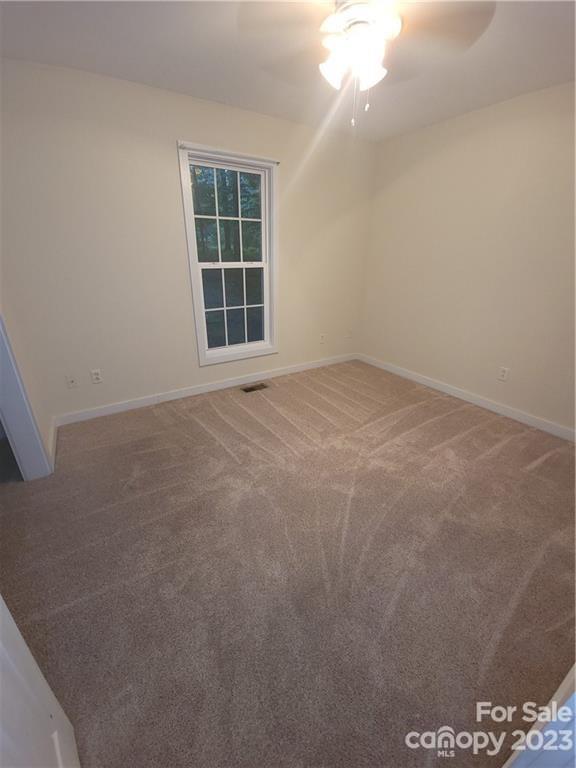 362 Ewaldz Road Blacksburg, SC 29702 - Photo 8 of 13 a view of an empty room with a window