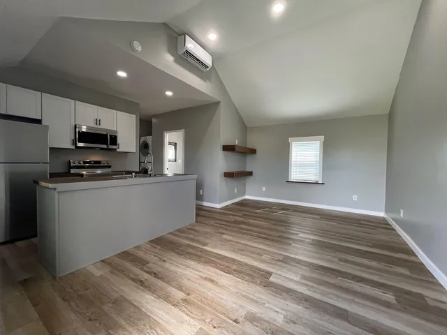 a view of kitchen and microwave