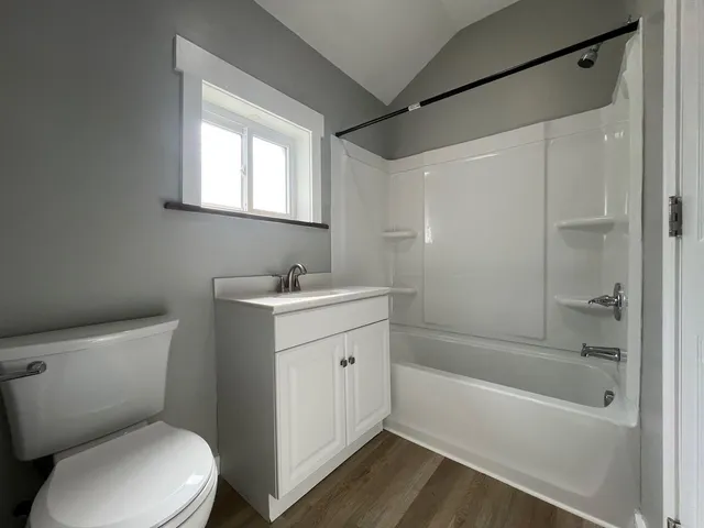 a view of a big room with wooden floor