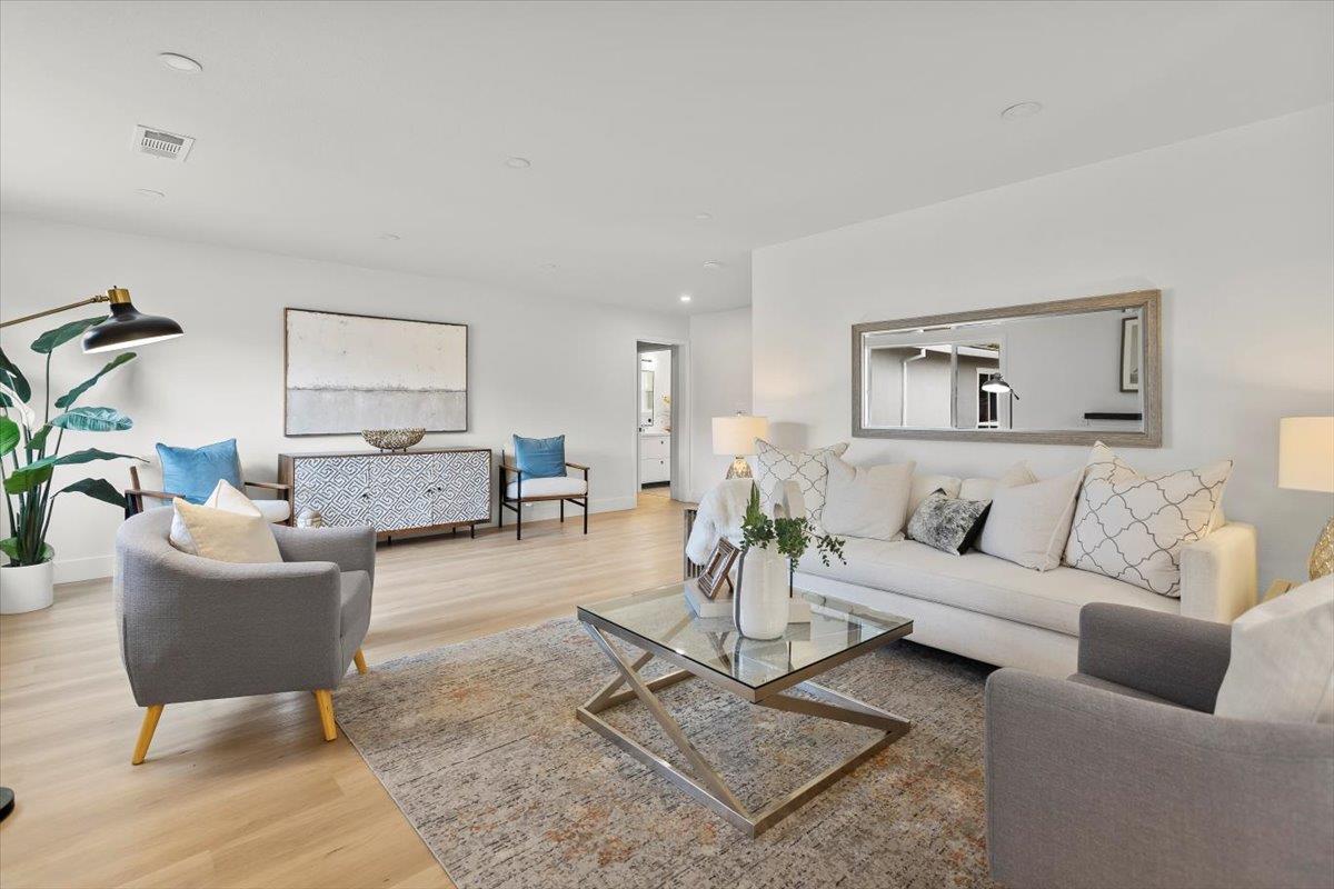 699 Cambrian Drive Campbell, CA 95008 - Photo 11 of 35 a living room with furniture and a rug