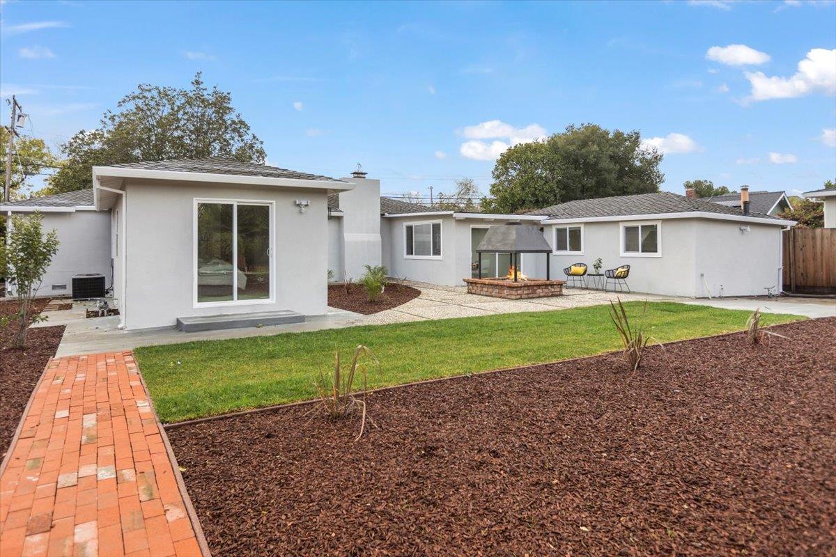 699 Cambrian Drive Campbell, CA 95008 - Photo 28 of 35 a view of a house with a backyard