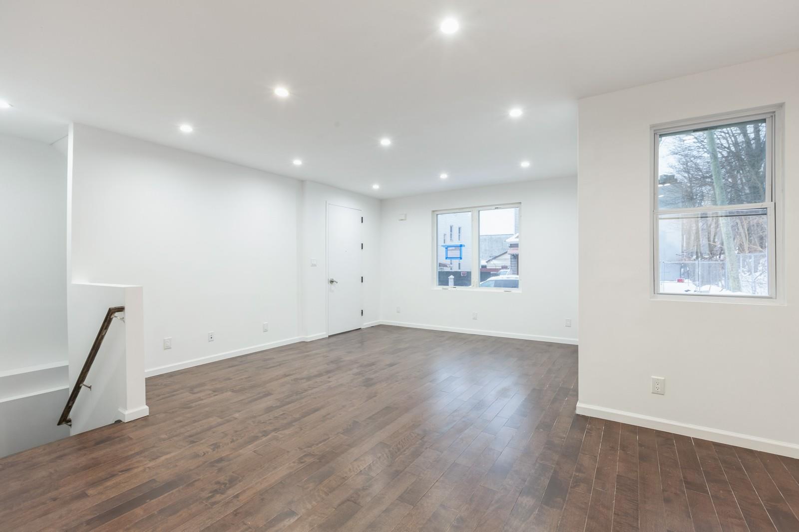 100-03 90th Avenue Queens, NY 11418 - Photo 5 of 18 Empty room with baseboards, dark wood-style flooring, and recessed lighting