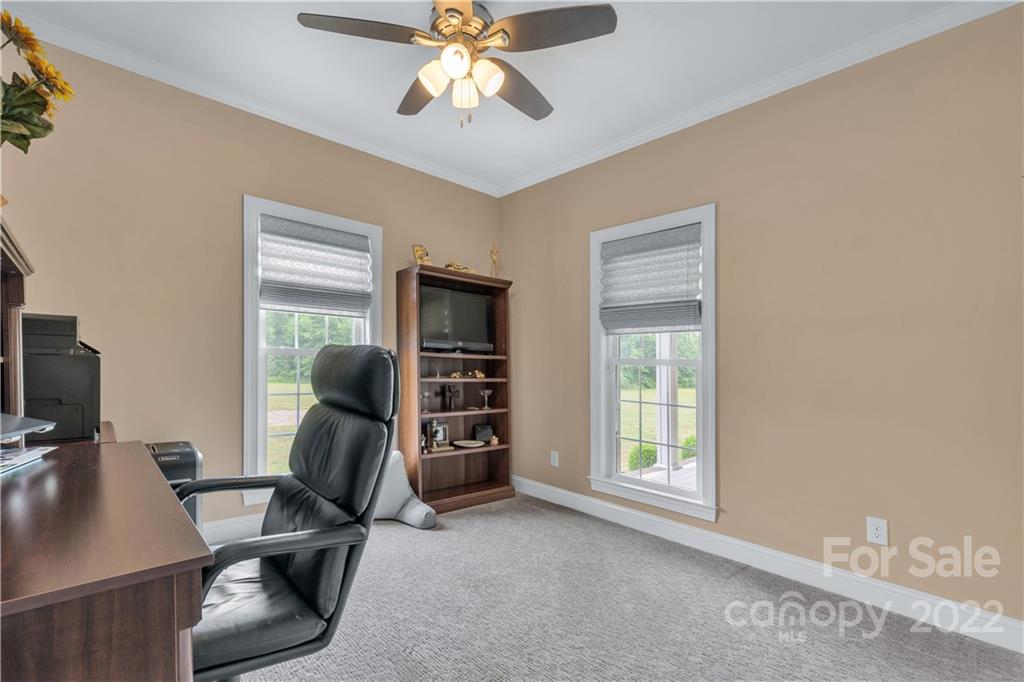 2510 South Potter Road Lancaster, SC 29720 - Photo 20 of 39 a view of a workspace with furniture and a window