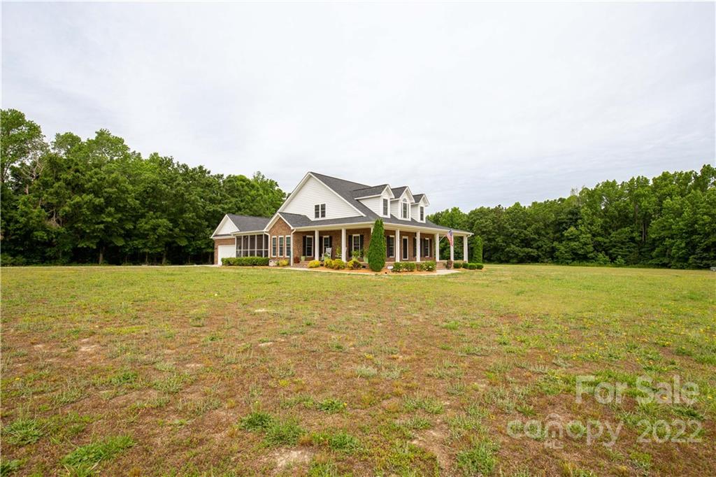 2510 South Potter Road Lancaster, SC 29720 - Photo 4 of 39 a front view of a house with a garden
