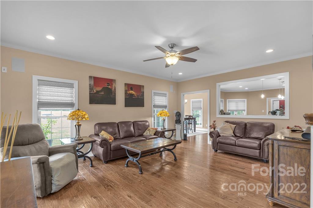2510 South Potter Road Lancaster, SC 29720 - Photo 7 of 39 a living room with furniture and wooden floor