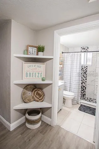 a view of livingroom with furniture and window