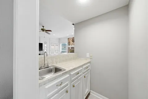a view of storage and utility room with washer and dryer