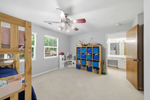 a view of a livingroom with furniture and window
