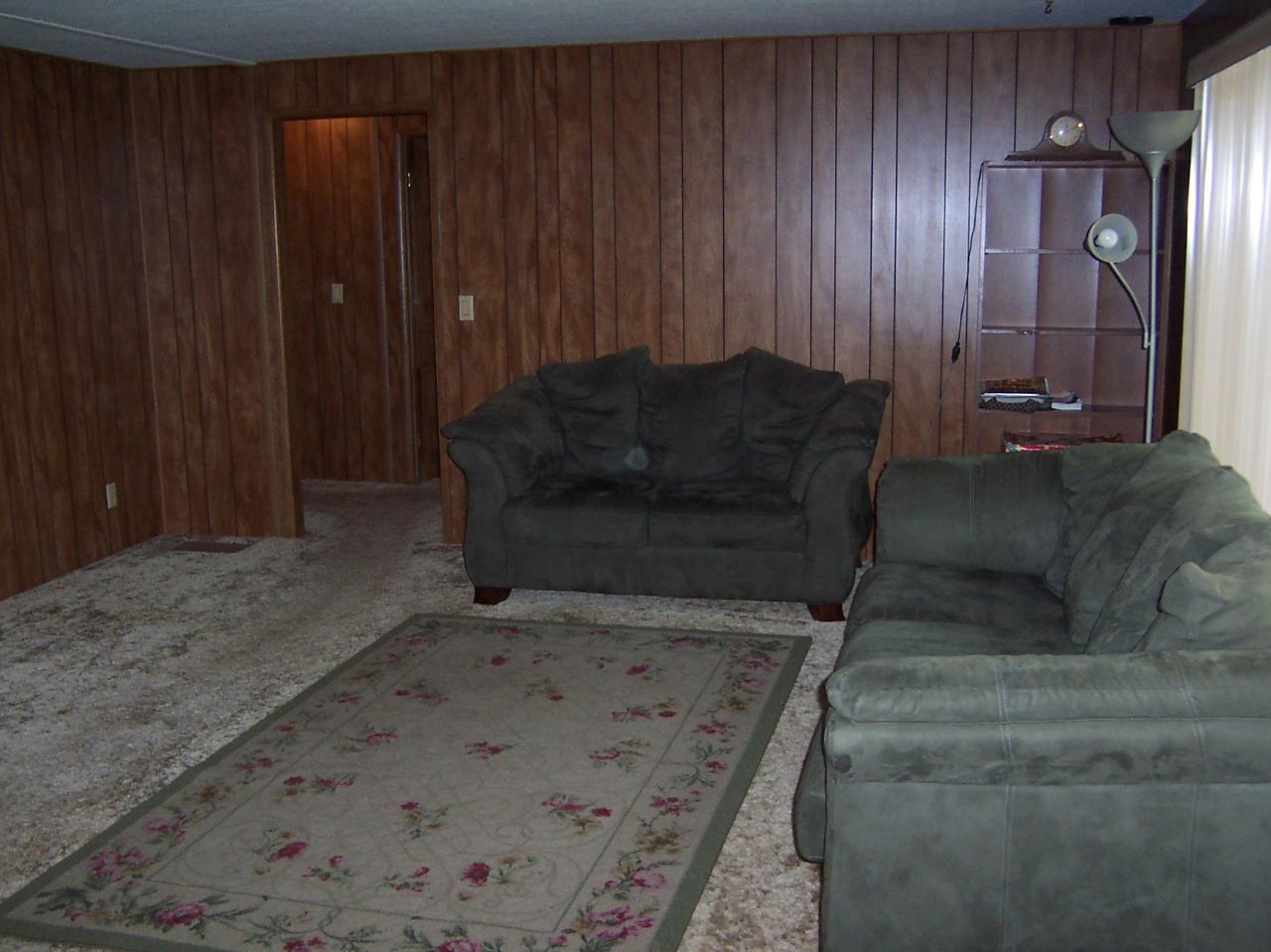 3191 Sheller Road Sunnyside, WA 98944 - Photo 5 of 6 a living room with couches and painted walls