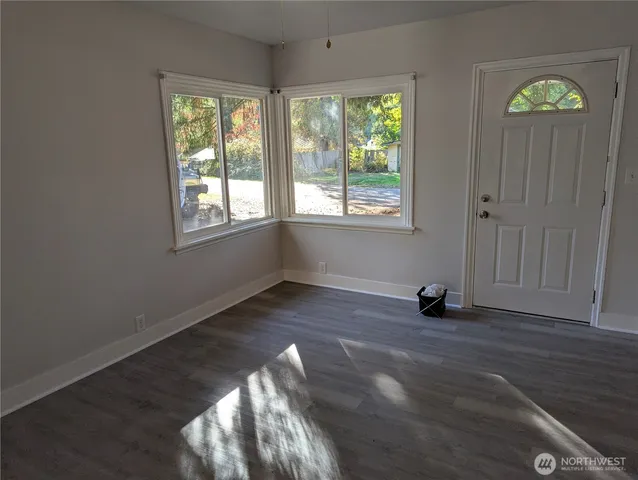 an empty room with windows