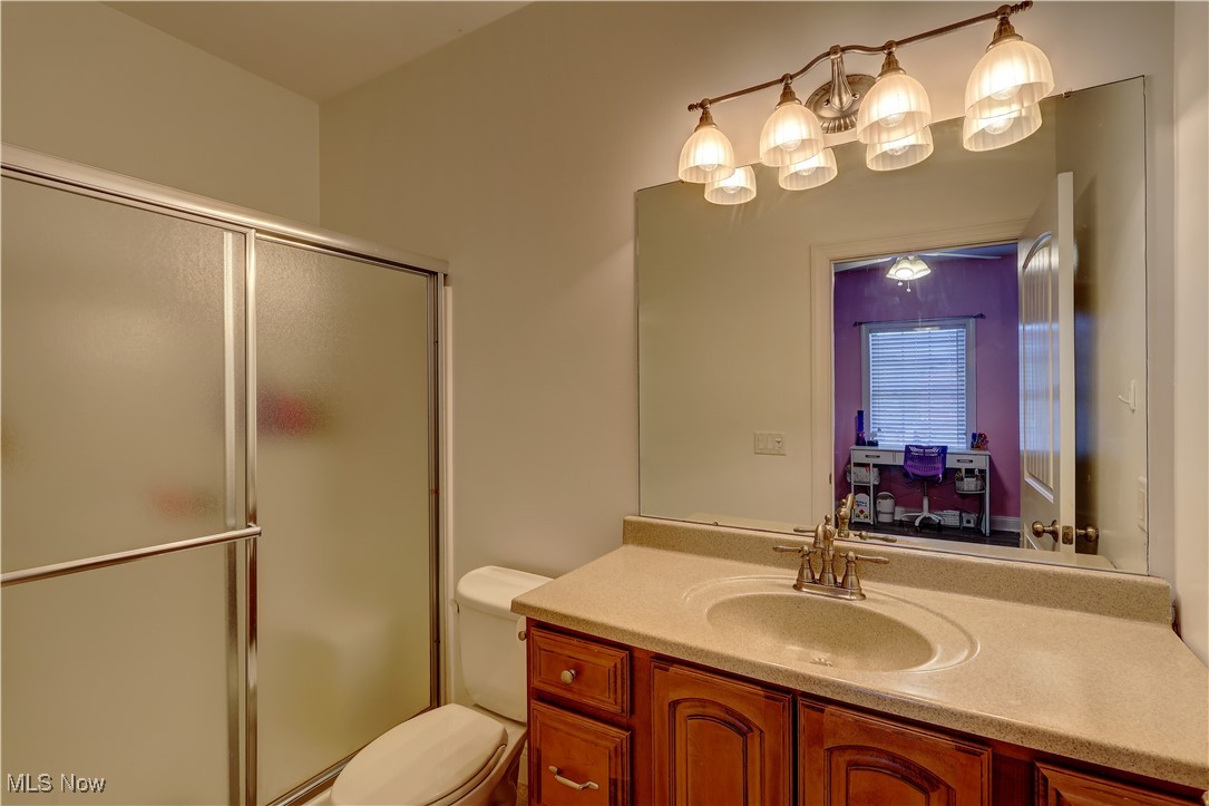 3079 Alexander Road Atwater, OH 44201 - Photo 17 of 45 Bathroom with vanity and a shower stall