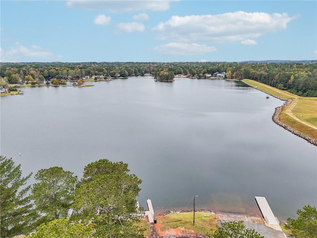7379 North Mitchell Court Villa Rica, GA 30180 - Photo 55 of 82 a view of a lake with a city