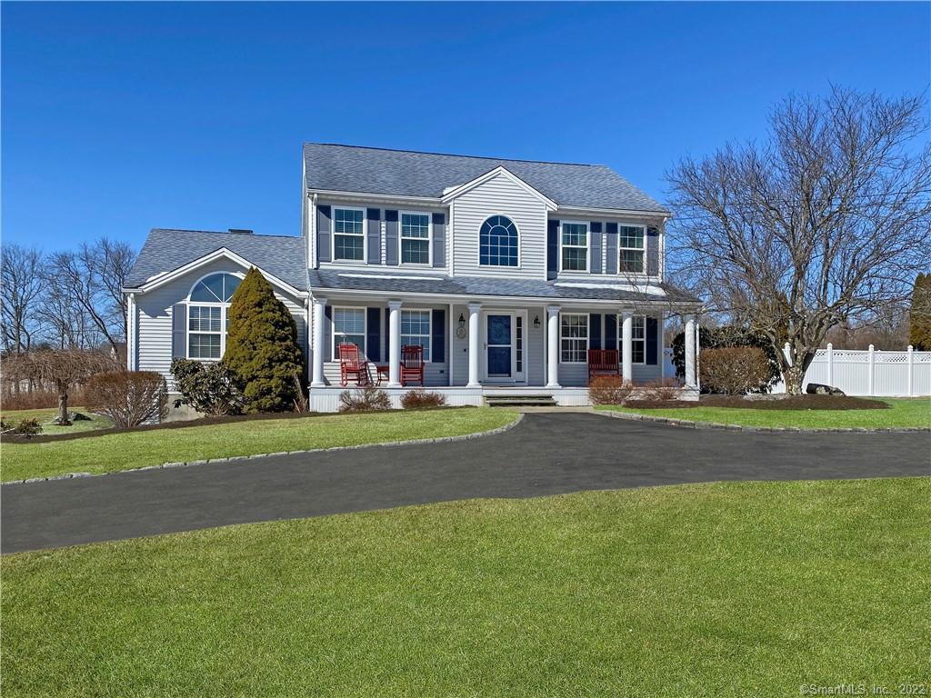 15 Autumn Ridge Road Oxford, CT 06478 - Photo 1 of 1 a front view of a house with a garden