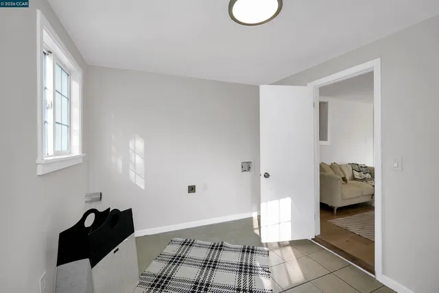 an aerial view of a house with a yard swimming pool and outdoor seating