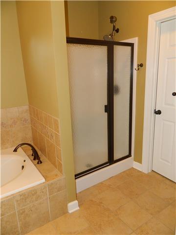 230 Curd Road Mount Juliet, TN 37122 - Photo 8 of 13 a bathroom with a shower