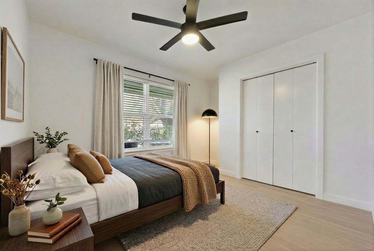 7902 Copano Drive Austin, TX 78749 - Photo 16 of 25 a bedroom with a bed and a chandelier