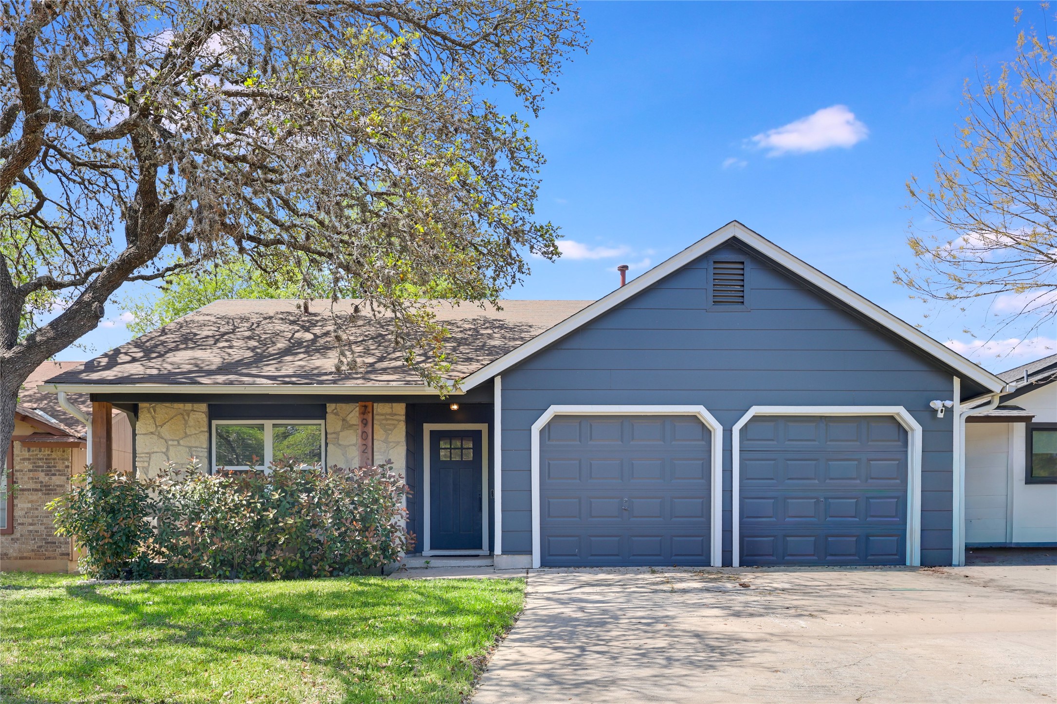 7902 Copano Drive Austin, TX 78749 - Photo 2 of 25 a front view of a house with garden