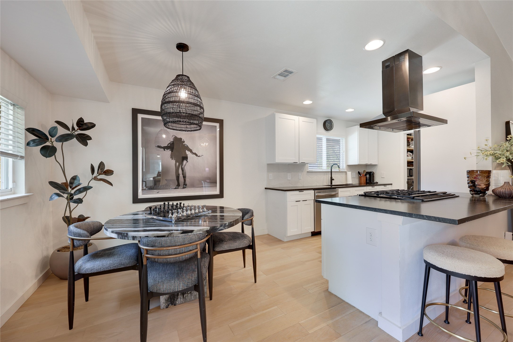 7902 Copano Drive Austin, TX 78749 - Photo 8 of 25 a kitchen with stainless steel appliances granite countertop a sink stove and refrigerator