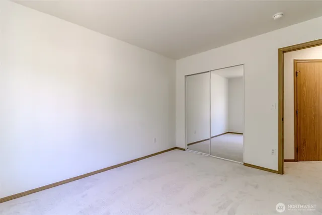 an empty room with closet