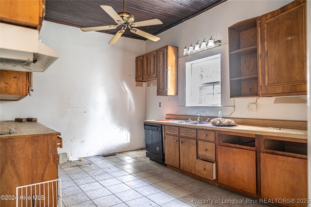 801 Monroe Street Carthage, NC 28327 - Photo 13 of 20 a kitchen with a sink appliances and cabinets