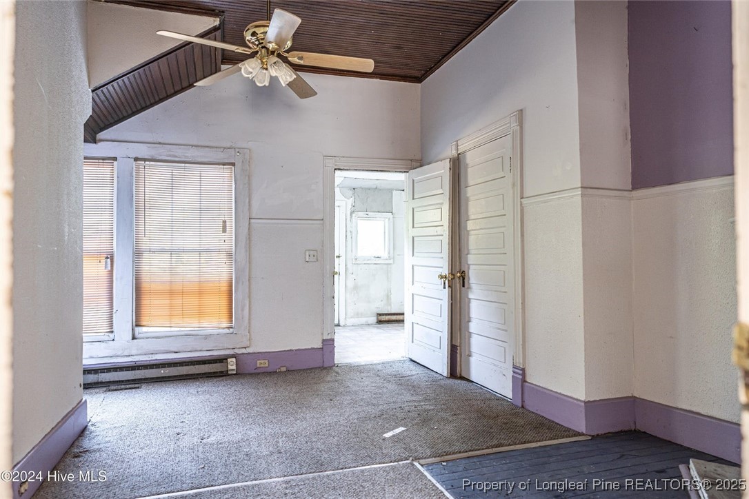801 Monroe Street Carthage, NC 28327 - Photo 18 of 20 a view of an empty room with a window