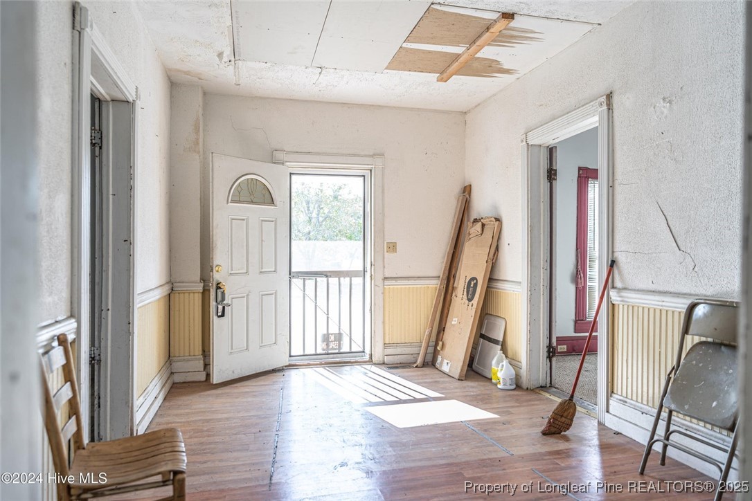 801 Monroe Street Carthage, NC 28327 - Photo 9 of 20 a view of an entryway with wooden floor and door