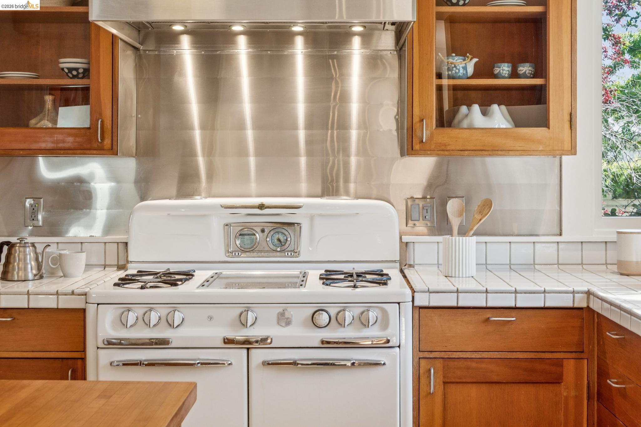 1490 Arch Street Berkeley, CA 94708 - Photo 20 of 57 a stove top oven sitting inside of a kitchen