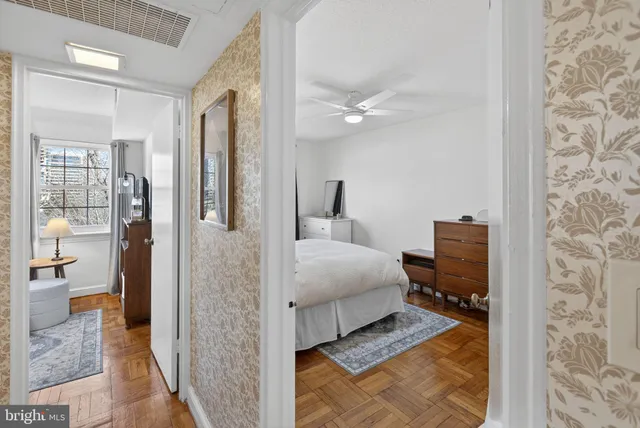 a en suite bathroom with a double vanity sink and a mirror