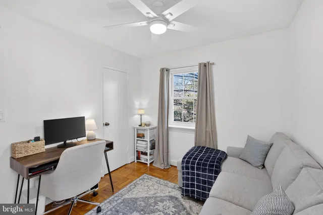 a bedroom with furniture and a window