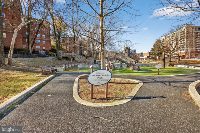 a backyard of a house with outdoor seating