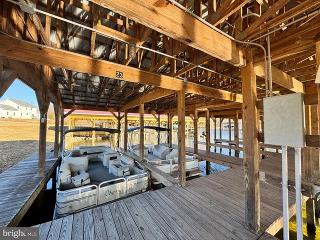 a view of balcony with couch and wooden floor
