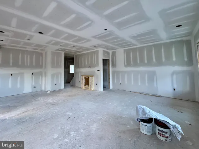 a view of room with furniture and a window