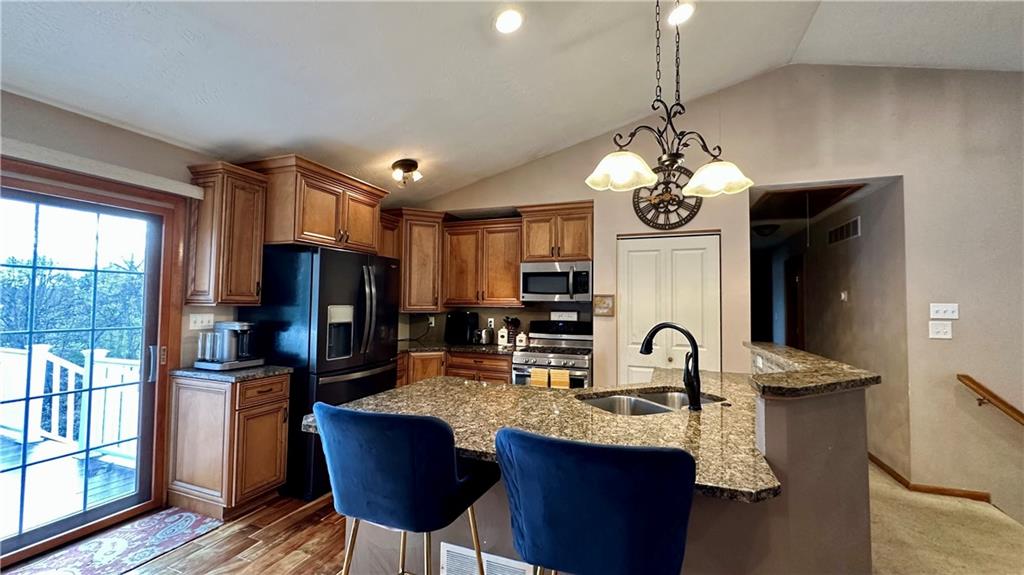 6949 Shannon Road Verona, PA 15147 - Photo 14 of 49 a kitchen with counter space appliances and furniture