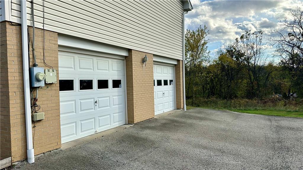 6949 Shannon Road Verona, PA 15147 - Photo 3 of 49 a view of a house with a backyard