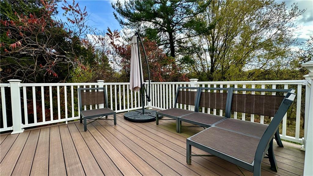 6949 Shannon Road Verona, PA 15147 - Photo 41 of 49 a view of a wooden deck with a bench