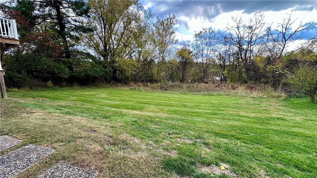6949 Shannon Road Verona, PA 15147 - Photo 49 of 49 a backyard of a house with lots of green space
