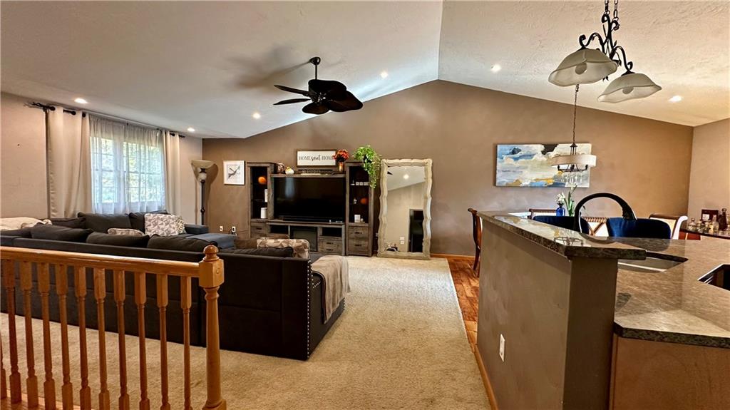 6949 Shannon Road Verona, PA 15147 - Photo 7 of 49 a kitchen with stainless steel appliances granite countertop a sink dishwasher a stove and a refrigerator with wooden floor