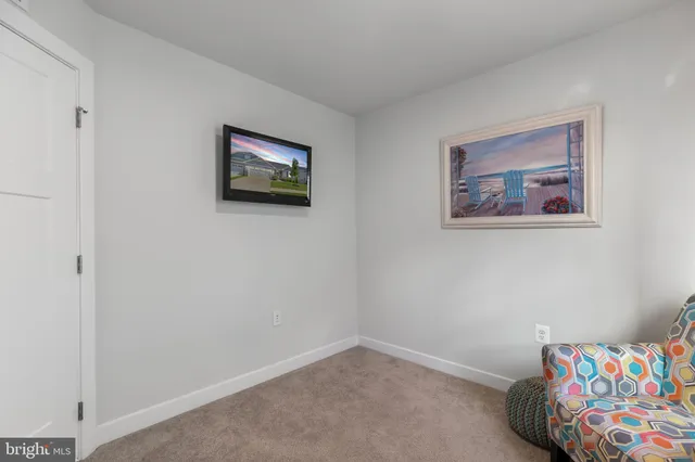 a view of a swimming pool with an outdoor seating and a yard