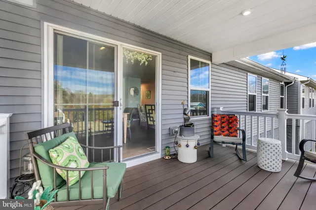 a picture of a bench in front of a gate