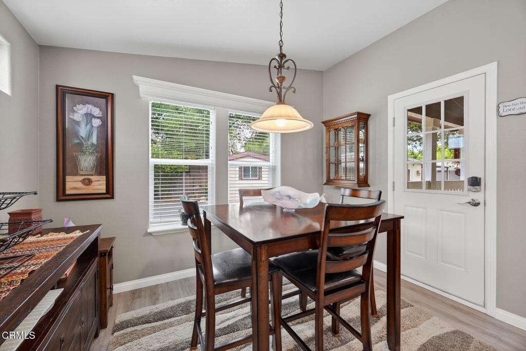 1273 South Rice Road, Unit 53 Ojai, CA 93023 - Photo 12 of 42 a view of a dining room with furniture window and outside view